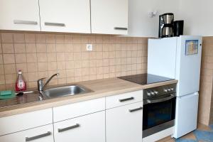 Kuchyň nebo kuchyňský kout v ubytování Schöne 3 Zimmerwohnung in Düren + 2 fotografie