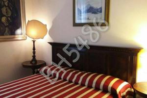 A bed or beds in a room at BARTHOUSE5486