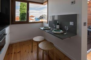 A kitchen or kitchenette at Vivienda El Ciprés. Terraza con espectaculares vistas al Mar.