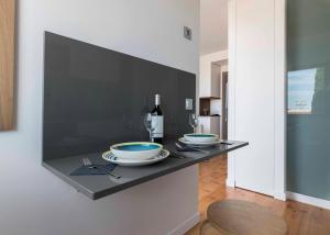 A kitchen or kitchenette at Vivienda El Ciprés. Terraza con espectaculares vistas al Mar.