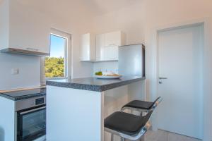 Fotografie z fotogalerie ubytování LUNA Residence v Novalji