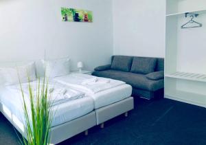 Postel nebo postele na pokoji v ubytování BNB Potsdamer Platz Rooms & Apartments