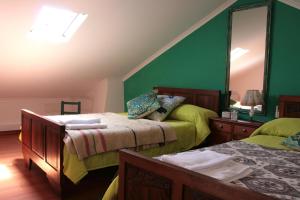 Кровать или кровати в номере Comporta Family House