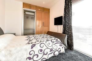 A bed or beds in a room at Villa Josefina