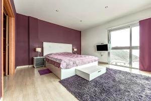Postel nebo postele na pokoji v ubytování Villa Josefina + 29 fotografií
