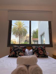 Postel nebo postele na pokoji v ubytování Central Suites Down Town Nicosia