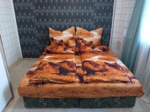 Katil atau katil-katil dalam bilik di Luxury Eagle apartman