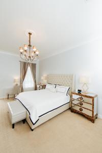 A bed or beds in a room at The William Boerne