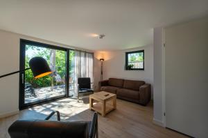 Χώρος καθιστικού στο Huize Kreek en Zee