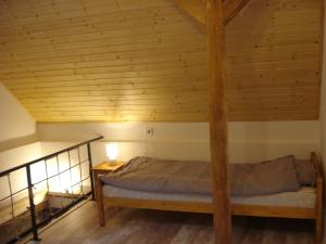Llit o llits en una habitació de Takács vendégház