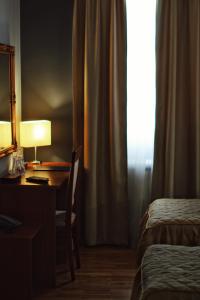 מיטה או מיטות בחדר ב-Hotel IL Sole