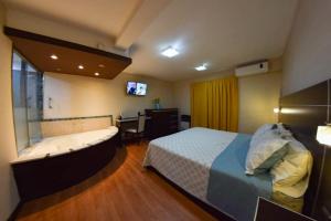 Ένα ή περισσότερα κρεβάτια σε δωμάτιο στο La Frida Hotel - ADULTS ONLY +78 φωτογραφίες