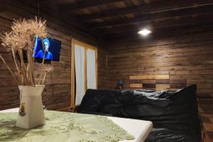 Χώρος καθιστικού στο Cabaña La Soñada, aire puro y naturaleza