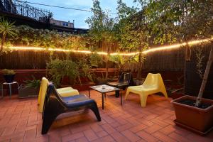 Vonkajšia záhrada v ubytovaní Ella Hostel Gran Vía