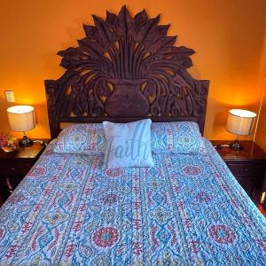 Llit o llits en una habitació de Casa Monarca