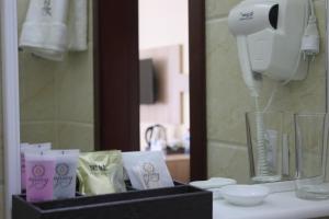 Salle de bains dans l'établissement Park Hotel al Bustan