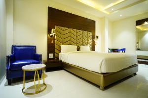 Postel nebo postele na pokoji v ubytování Orange Tree Hotels