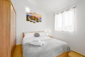 Postel nebo postele na pokoji v ubytování Holiday Home Drvenik