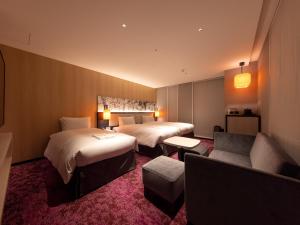 Ліжко або ліжка в номері Hotel Forza Kyoto Shijo Kawaramachi