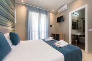 Posteľ alebo postele v izbe v ubytovaní Bed and Breakfast Marlè