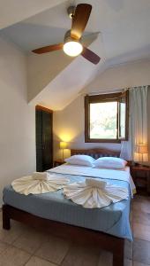 Ένα ή περισσότερα κρεβάτια σε δωμάτιο στο Doma Apartments 