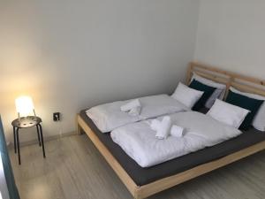 Voodi või voodid majutusasutuse Imola Apartman Fonyód toas