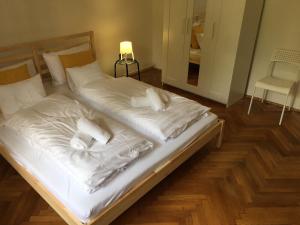 Voodi või voodid majutusasutuse Imola Apartman Fonyód toas