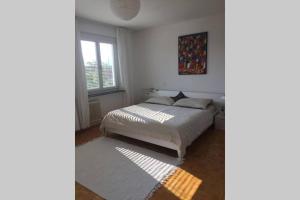 Posteľ alebo postele v izbe v ubytovaní Geräumiges Familienapartment