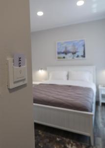 Postel nebo postele na pokoji v ubytování Hotel Peroni