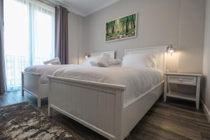 Postel nebo postele na pokoji v ubytování Hotel Peroni