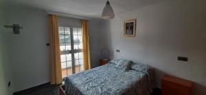 Posteľ alebo postele v izbe v ubytovaní Moclinejo House