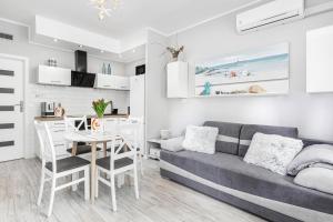 Kuchyňa alebo kuchynka v ubytovaní Rezydencja Portowa 14 - Jantar Apartamenty + 4 fotografie