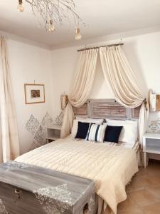Postel nebo postele na pokoji v ubytování Casa Caterina Lake View Holidays