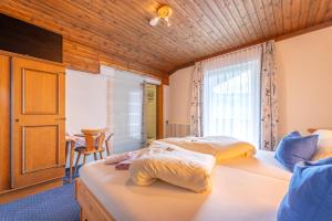 Postel nebo postele na pokoji v ubytování Panoramahotel Stocker