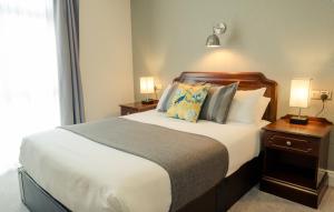 Letto o letti in una camera di Hillgrove Guesthouse