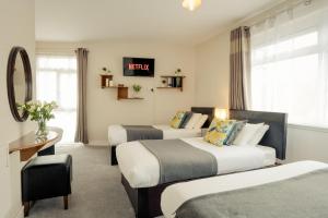 TV o dispositivi per l'intrattenimento presso Hillgrove Guesthouse