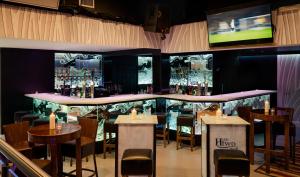 TV o dispositivi per l'intrattenimento presso Hillgrove Guesthouse