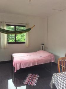 Postel nebo postele na pokoji v ubytování PAPAYAS SELF catering ROOM