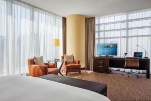 TV a/nebo společenská místnost v ubytování City Centre Rotana Doha
