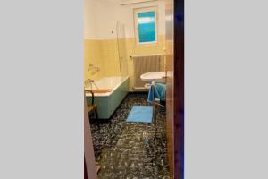 Kúpeľňa v ubytovaní Ferienappartement Bellevue Wörthersee - privater Seezugang, Hunde auch herzlich willkommen + 19 fotografií