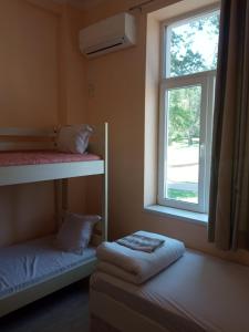 Postel nebo postele na pokoji v ubytování Hostel Ginger House