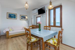 TV a/nebo společenská místnost v ubytování Apartment Lanterna Veneziana