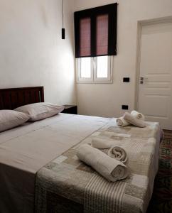 A bed or beds in a room at Loft Marettimo Egadi