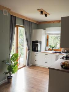 Kuchyňa alebo kuchynka v ubytovaní Apartament MONTANA
