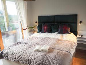 Posteľ alebo postele v izbe v ubytovaní Apartament MONTANA