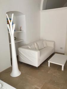 Postel nebo postele na pokoji v ubytování B&B LEOPARDI