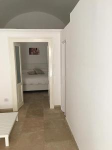 Postel nebo postele na pokoji v ubytování B&B LEOPARDI