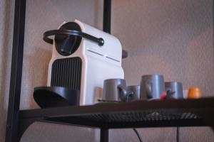 Utensilios para hacer té y café en Hotel Vondel Garden - Digital Access
