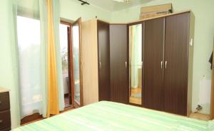 Posteľ alebo postele v izbe v ubytovaní Apartment in Kali with sea view, terrace, air conditioning, WiFi (4230-3)