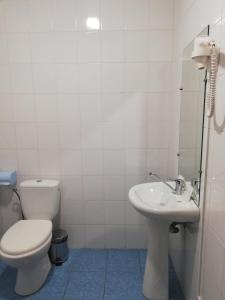 Koupelna v ubytování Prometey Hotel